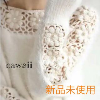 カワイイ(cawaii)の【新品・未使用】流れ咲く花コサージュのニット(ニット/セーター)