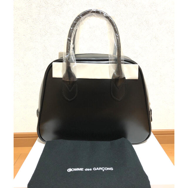 COMME des GARCONS(コムデギャルソン)の年末限定値下げ　コムデギャルソン　台形レザーバッグ　青山バッグ レディースのバッグ(ハンドバッグ)の商品写真