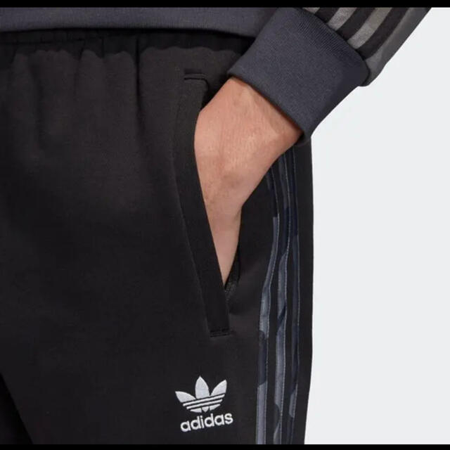 adidas(アディダス)のアディダス　カモフラージュ　トラックパンツ メンズのパンツ(その他)の商品写真