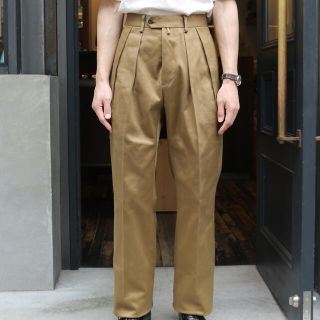 コモリ(COMOLI)のNEAT TURPAN STAIN SANDARD 【taupe】(スラックス)