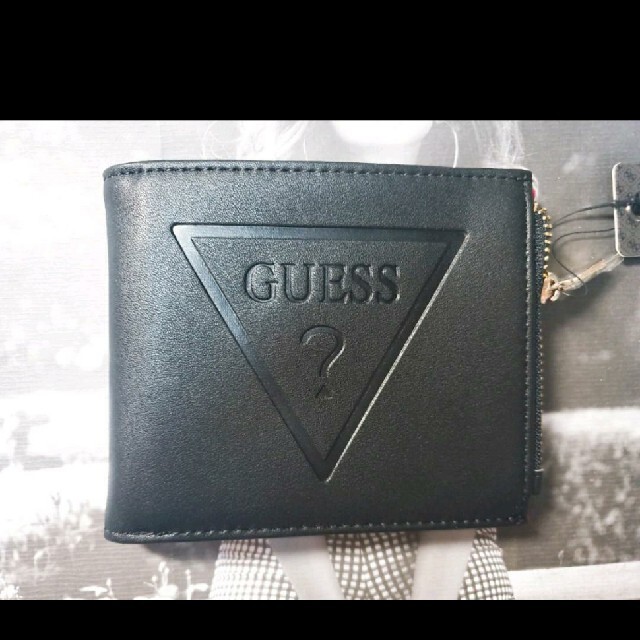 GUESS(ゲス)の【大人気】型押しロゴ ゲス エンボス 財布 ゲス メンズ 小銭入れ レディースのファッション小物(財布)の商品写真