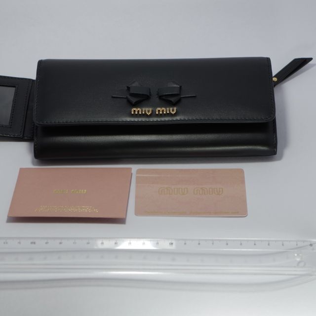 【新品】ミュウミュウ 長財布 本革 リボン 財布 ブラック レディース | フリマアプリ ラクマ