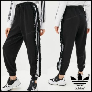 アディダス(adidas)のadidas フリルトラックパンツ(カジュアルパンツ)