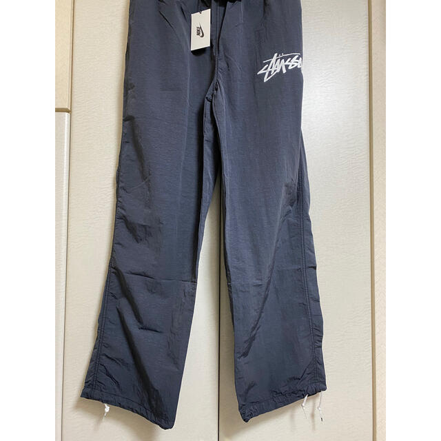 STUSSY(ステューシー)のステューシー　ナイキ　ナイロンパンツ　L メンズのパンツ(その他)の商品写真