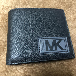 マイケルコース(Michael Kors)の【新品未使用】マイケルコース　二つ折り財布(折り財布)