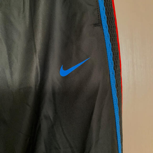 NIKE(ナイキ)のharu様専用　NIKEナイロンパンツ＆アディダスゴルシャツ＆アバクロセーター レディースのパンツ(カジュアルパンツ)の商品写真