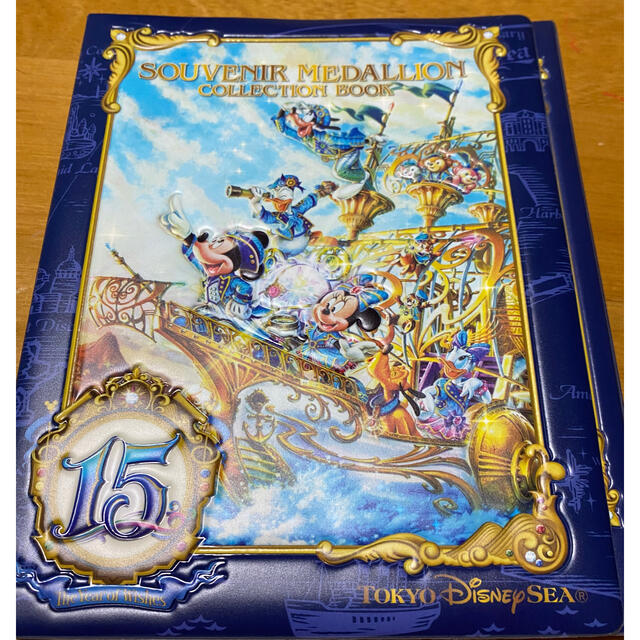 Disney(ディズニー)の値下げ中！15周年スーベニアメダルケース　メダル入り エンタメ/ホビーのコレクション(その他)の商品写真