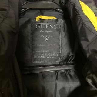 ゲス(GUESS)のGUESS 黄色ダウン(ダウンジャケット)