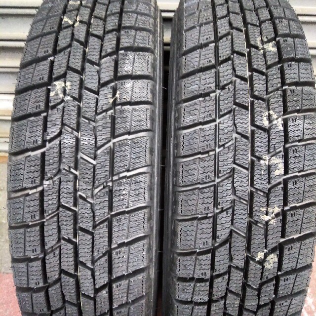 Goodyear(グッドイヤー)の155/65R14 goodyear新品スタッドレス&スズキ純正アルミ 自動車/バイクの自動車(タイヤ・ホイールセット)の商品写真