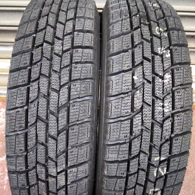 Goodyear(グッドイヤー)の155/65R14 goodyear新品スタッドレス&スズキ純正アルミ 自動車/バイクの自動車(タイヤ・ホイールセット)の商品写真