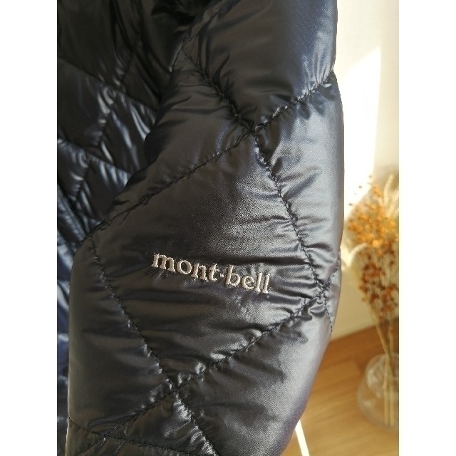 mont bell(モンベル)の【新品】モンベル トラベルダウンコート レディースのジャケット/アウター(ダウンジャケット)の商品写真