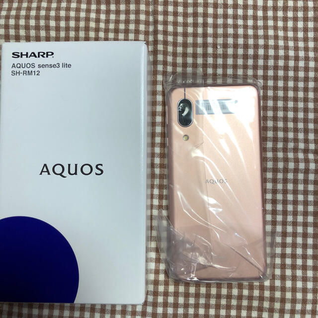 SHARP(シャープ)のSHARP AQUOS sense3 lite ライトカッパー スマホ/家電/カメラのスマートフォン/携帯電話(スマートフォン本体)の商品写真