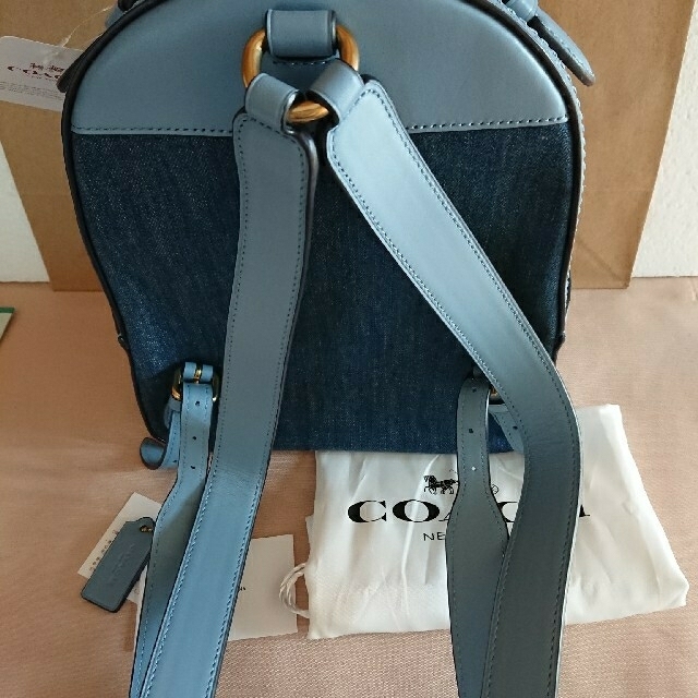 COACH(コーチ)のお菓子様専用　COACH  デニムティーローズリュック レディースのバッグ(リュック/バックパック)の商品写真