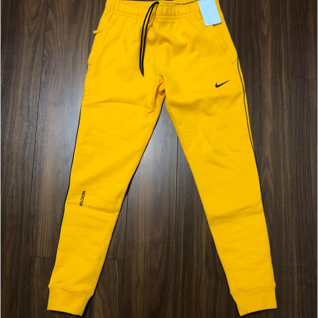 NIKE(ナイキ)のSサイズ　NOCTA NIKE SWEAT PANTS GOLD Yellow メンズのパンツ(その他)の商品写真