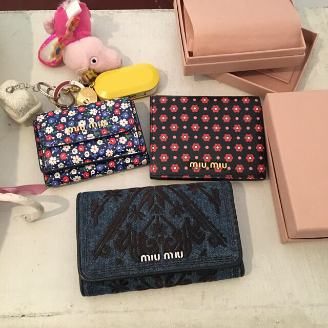 miumiu denim wallet.