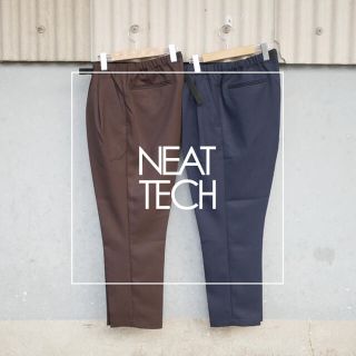 コモリ(COMOLI)のNEAT NEATTECH ブラウン　パンツ(スラックス)