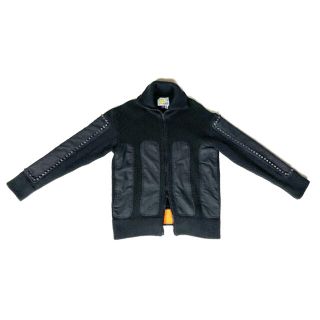 ウォルターヴァンベイレンドンク(Walter Van Beirendonck)の"W.&L.T." studs high neck knit blouson(ニット/セーター)