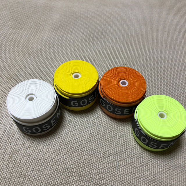 GOSEN(ゴーセン)のGOSENグリップテープ 4個 白黄オレンジ、フラッシュイエロー  ラクマパック チケットのスポーツ(テニス)の商品写真