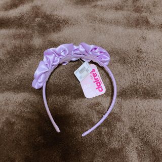 クレアーズ(claire's)の紫色　花　カチューシャ(カチューシャ)