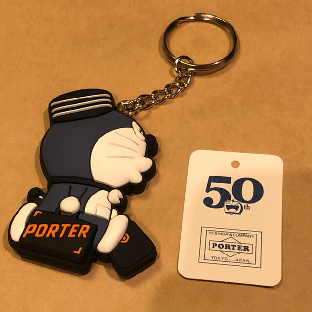 PORTER(ポーター)の新品★ドラえもん★ポーター★PORTER★横向き★ネイビー★キーホルダー エンタメ/ホビーのアニメグッズ(キーホルダー)の商品写真