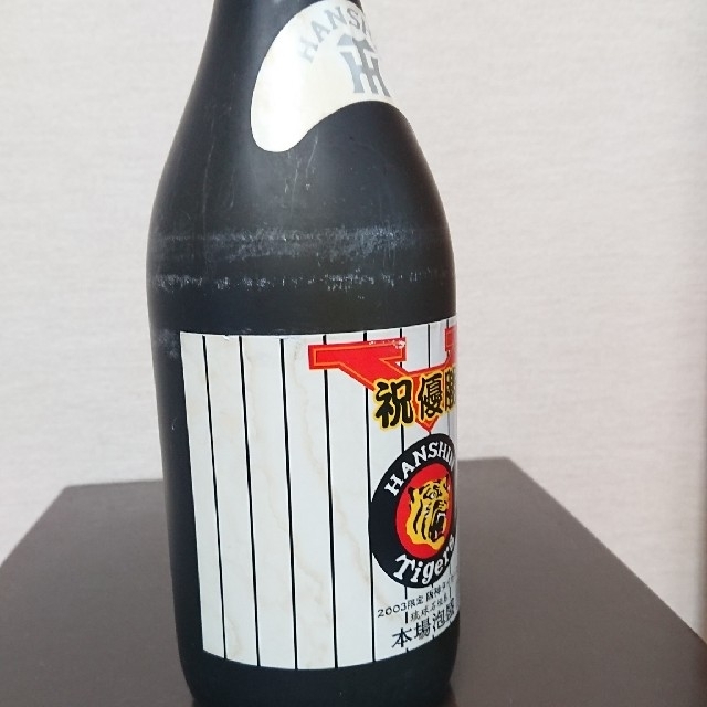 阪神タイガース(ハンシンタイガース)の泡盛  2003阪神タイガース優勝記念 食品/飲料/酒の酒(焼酎)の商品写真