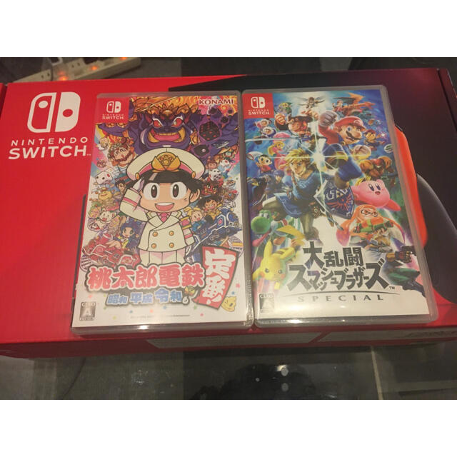 Nintendo Switch(ニンテンドースイッチ)の⭐︎ほぼ新品⭐︎任天堂Switch本体+桃鉄+スマブラ+3個コントローラ⭐︎ エンタメ/ホビーのゲームソフト/ゲーム機本体(家庭用ゲーム機本体)の商品写真