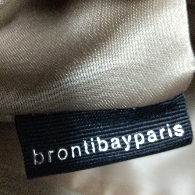 Brontibay Paris(ブロンティベイパリス)のブロンティベイパリス レディースバッグ リボンバッグ ゴールド 革 フランス製 レディースのバッグ(クラッチバッグ)の商品写真