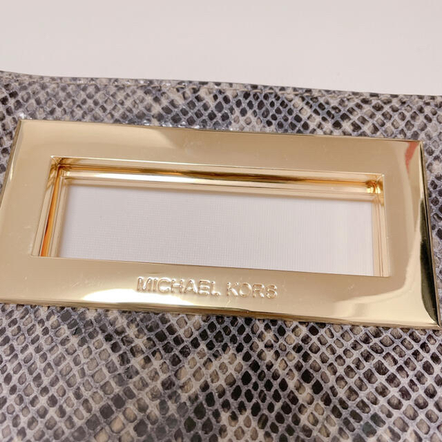 Michael Kors(マイケルコース)の【新品同様】MICHEAL KORS クラッチバッグ パイソン柄 レディースのバッグ(クラッチバッグ)の商品写真