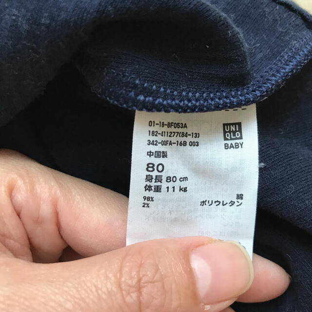 UNIQLO(ユニクロ)のkuruneko様専用　ユニクロ　リブハイネック長袖Tシャツ　80 キッズ/ベビー/マタニティのベビー服(~85cm)(シャツ/カットソー)の商品写真