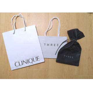 スリー(THREE)のショッパー&ラッピング<THREE、CLINIQUE>(ショップ袋)