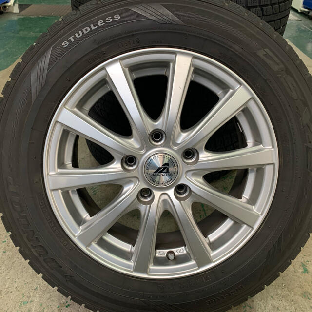 DUNLOP(ダンロップ)のスタッドレスタイヤ・ホイール４本セット　195/65R15ダンロップ 自動車/バイクの自動車(タイヤ・ホイールセット)の商品写真