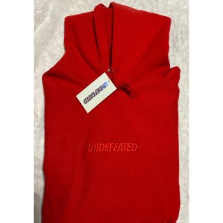 アンディフィーテッド(UNDEFEATED)のundefeated パーカー 赤 【新品未使用】(パーカー)