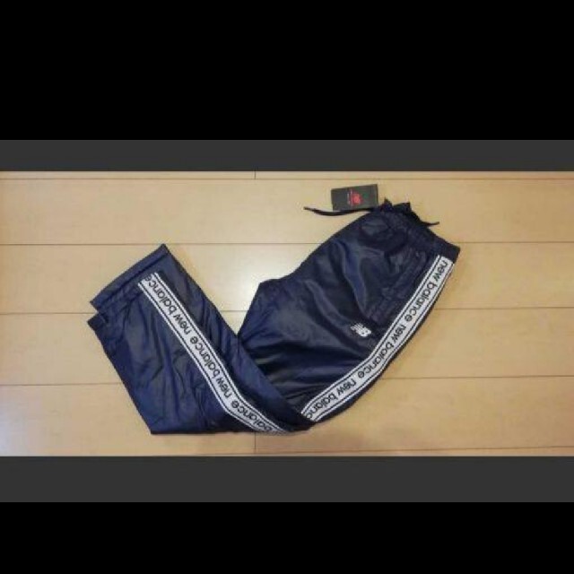 New Balance(ニューバランス)のニューバランス 中綿入りウィンドブレーカー下 メンズのパンツ(その他)の商品写真