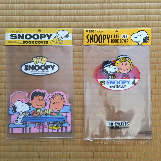 SNOOPY(スヌーピー)のone1さん専用、SNOOPYのクリアブックカバー7セット ハンドメイドの文具/ステーショナリー(ブックカバー)の商品写真