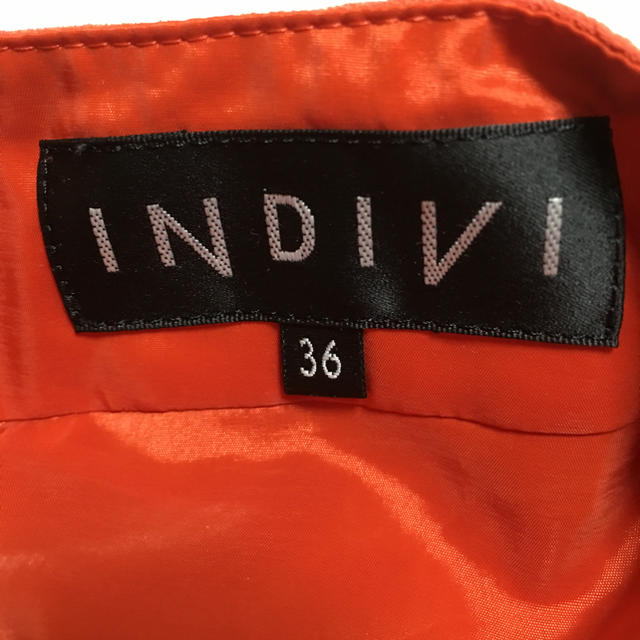 INDIVI(インディヴィ)のインディヴィオレンジスカート レディースのスカート(ひざ丈スカート)の商品写真