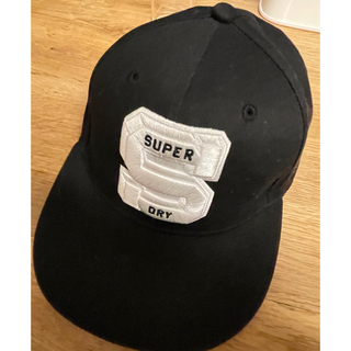 シュプリーム(Supreme)のチッポ様専用Superdry(極度乾燥しなさい) キャップ 帽子 黒(キャップ)