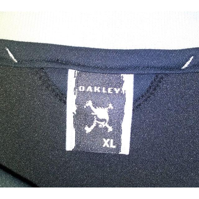 Oakley(オークリー)の【未使用品】Oakley黒ポロシャツ（半袖） メンズのトップス(ポロシャツ)の商品写真