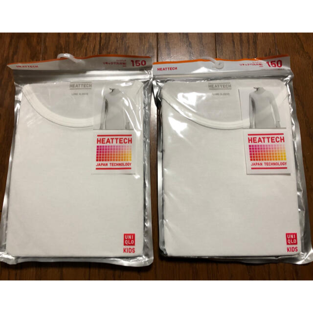 UNIQLO(ユニクロ)の【らんらんさん専用】　ユニクロ　ヒートテック　九部袖　U２枚　白色　150 キッズ/ベビー/マタニティのキッズ服男の子用(90cm~)(下着)の商品写真