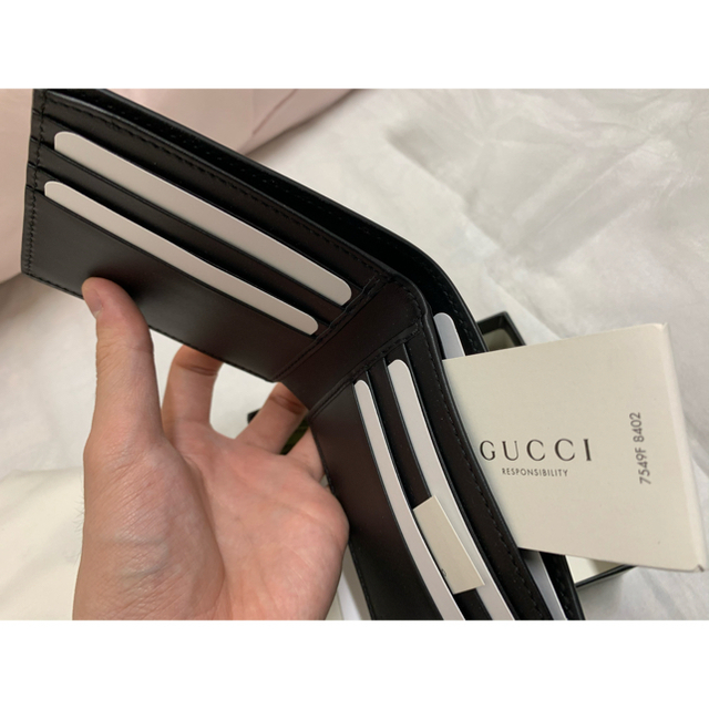 Gucci(グッチ)の【希少】完全正規品　新品未使用　GUCCI タイガー プリント GG ウォレット メンズのファッション小物(折り財布)の商品写真