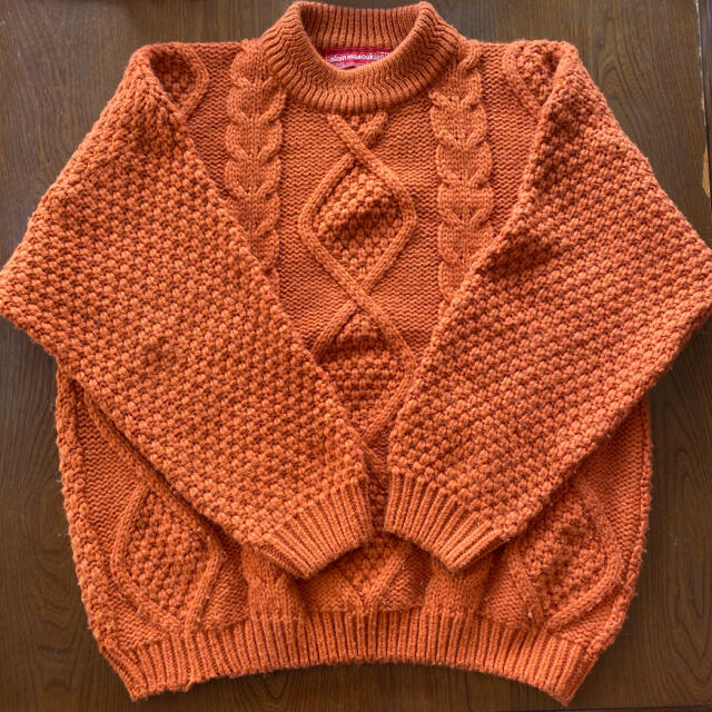 オレンジ ニット セーター