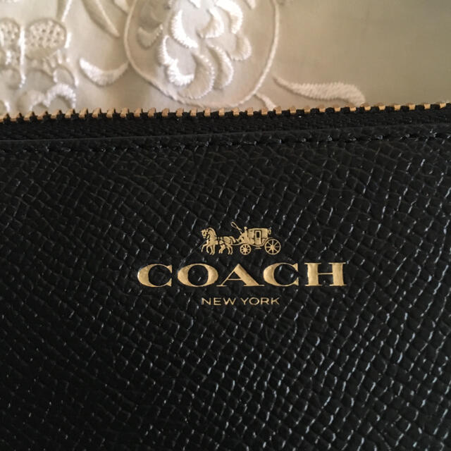 COACH(コーチ)のお値下げ新品タグ付きコーチポーチ(財布) レディースのファッション小物(ポーチ)の商品写真
