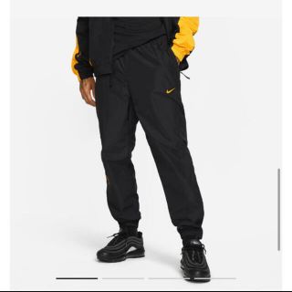 ナイキ(NIKE)のNIKE NOCTA NRG AU TRACK PANT L(ワークパンツ/カーゴパンツ)