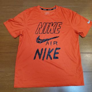 ナイキ(NIKE)の【美品】NIKE　シャツ　オレンジ(シャツ)