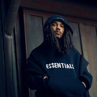 フィアオブゴッド(FEAR OF GOD)のessentials Fear of God 新作 ロゴニットフーディ L 黒(パーカー)