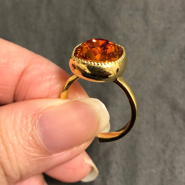 SWAROVSKI(スワロフスキー)のスワロフスキー オレンジ キラキラ ゴールド 調整可能 指輪 レディースのアクセサリー(リング(指輪))の商品写真