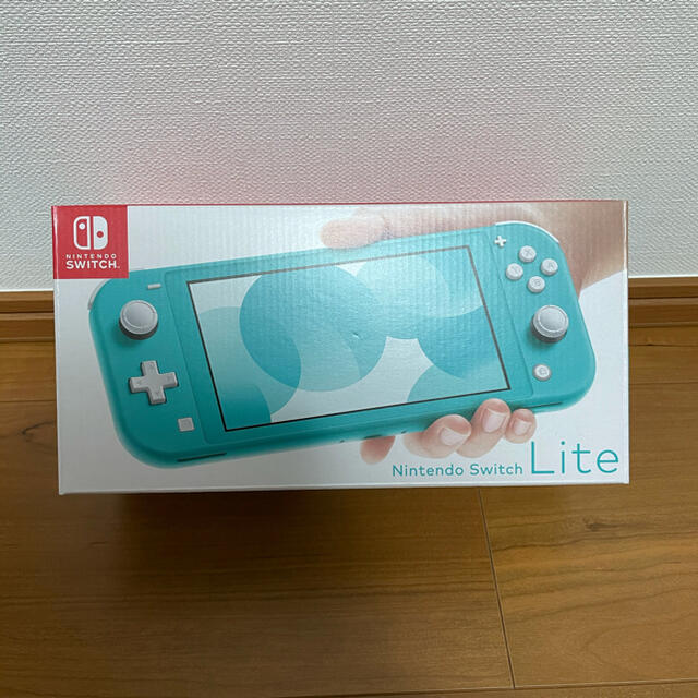 Nintendo Switch(ニンテンドースイッチ)の任天堂Switchライト　ブルー　おまけ付き エンタメ/ホビーのゲームソフト/ゲーム機本体(携帯用ゲーム機本体)の商品写真