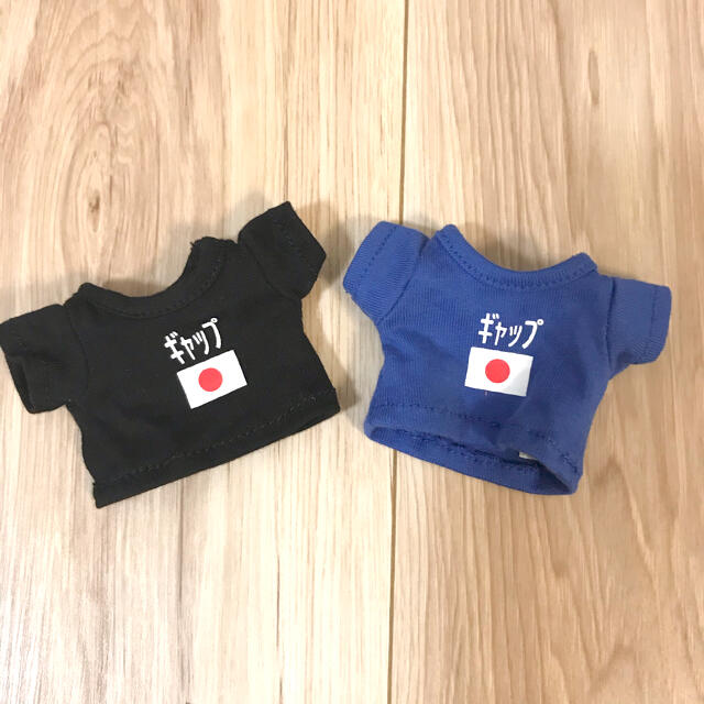 GAP(ギャップ)のGAP ガチャ ガチャガチャ Tシャツ2点セット 黒 青 かわいい 可愛い 人気 エンタメ/ホビーのおもちゃ/ぬいぐるみ(ぬいぐるみ)の商品写真