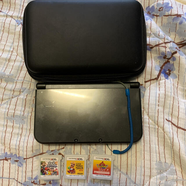 ニンテンドー3DS(ニンテンドー3DS)のNEW  Nintendo 3DS LL カセット付き　カバー付き　DS エンタメ/ホビーのゲームソフト/ゲーム機本体(携帯用ゲーム機本体)の商品写真
