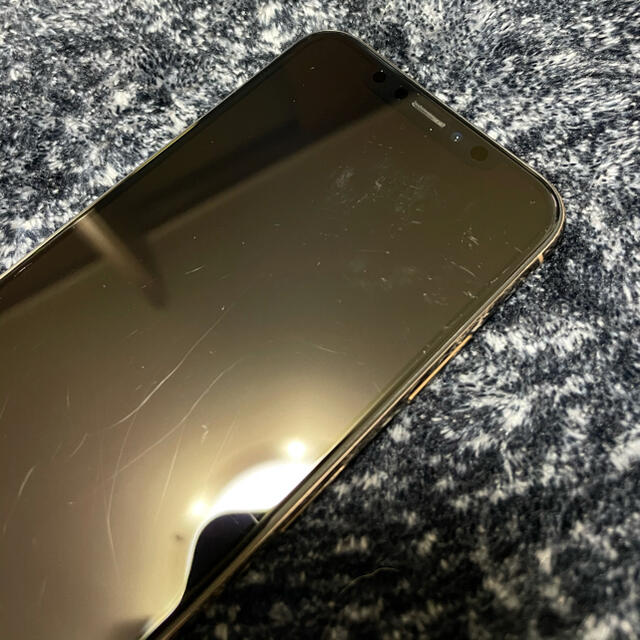 iPhone(アイフォーン)のiphoneXS   256GB  ゴールド　おまけ付き スマホ/家電/カメラのスマートフォン/携帯電話(スマートフォン本体)の商品写真