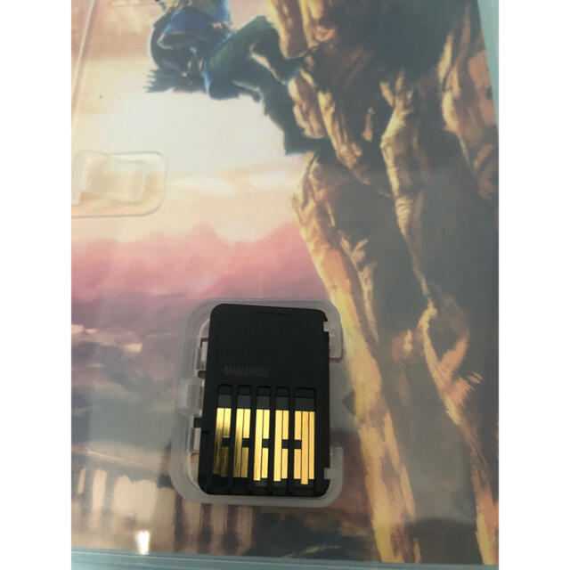Nintendo Switch(ニンテンドースイッチ)のゼルダの伝説ブレスオブザワイルドガイドブック付き エンタメ/ホビーのゲームソフト/ゲーム機本体(家庭用ゲームソフト)の商品写真